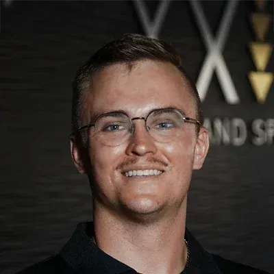 A headshot photo of Dr. Collin Jensen, chiropractor at Axis Spine and Sport - Tempe