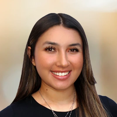A headshot photo of Laura
